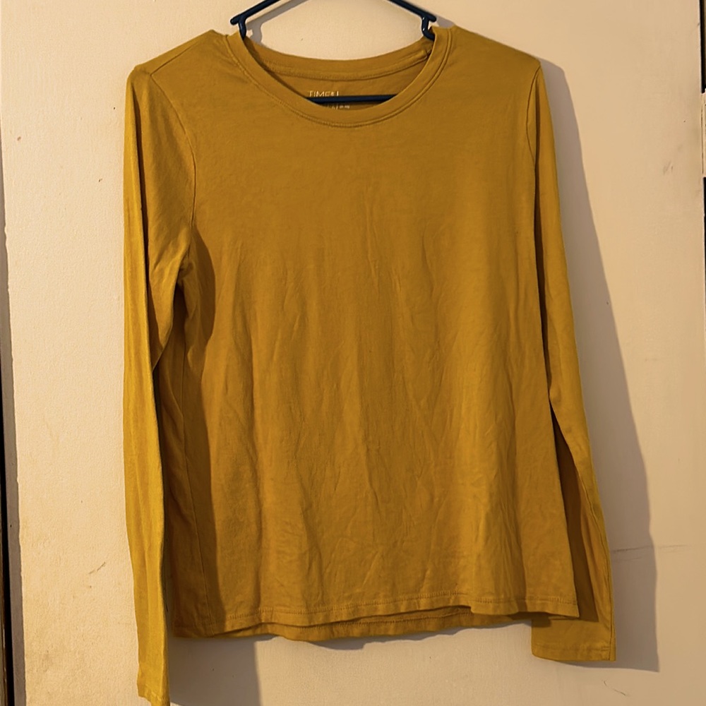 yellow long sleeve shirt